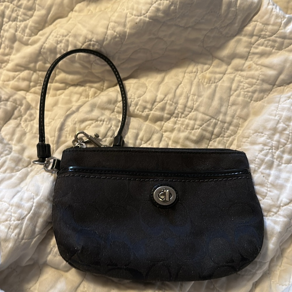 coach wristlet twist class front zipper closure, altered strap see picture